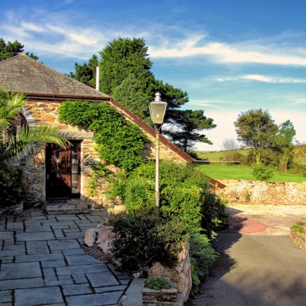 Looking from the Courtyard to the Large Gardens of Hendra Paul Holiday Cottages Cornwall