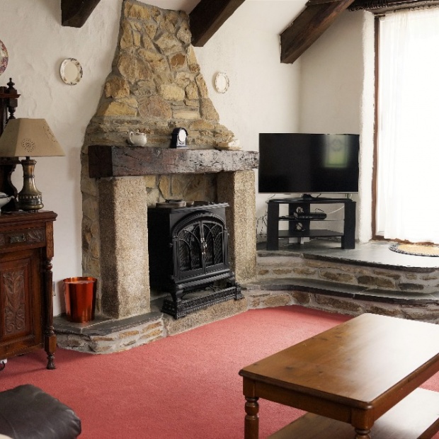 Traditional Stone Fireplace in Badgers Sett Holiday Cottage Cornwall