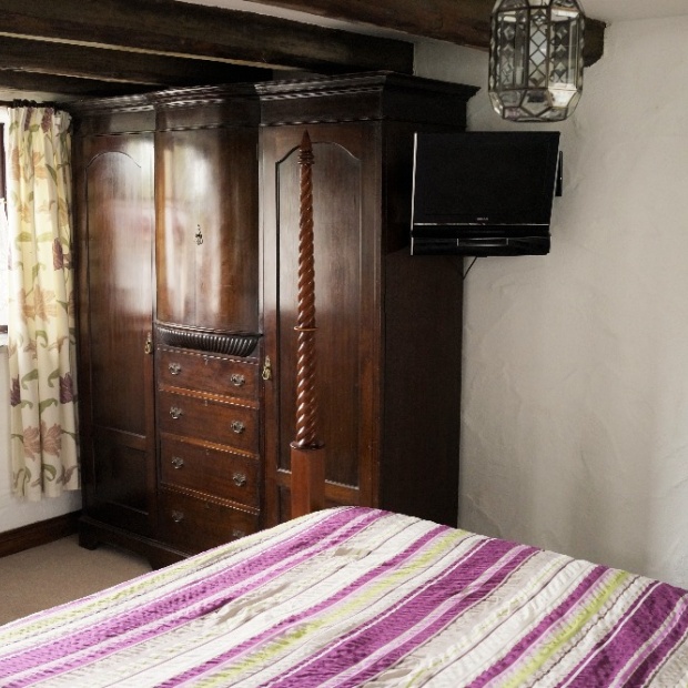Four Poster Master Bedroom in Badgers Sett Holiday Cottage Cornwall